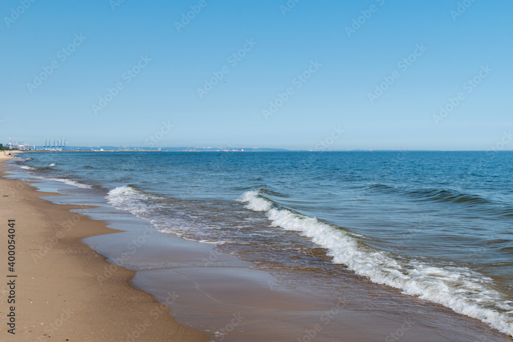 Summer view on shores of the Baltic Sea Beach in Gdansk Sobieszewo, Poland.
