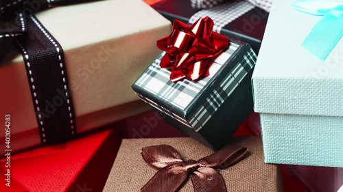 Set of gift boxes of different sizes and colors. Dolly In Shot. 4K.