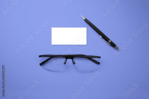 glasses and pen on the table