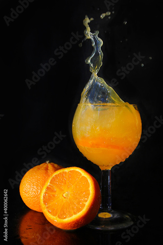 Fototapeta Naklejka Na Ścianę i Meble -  orange juice in a glass