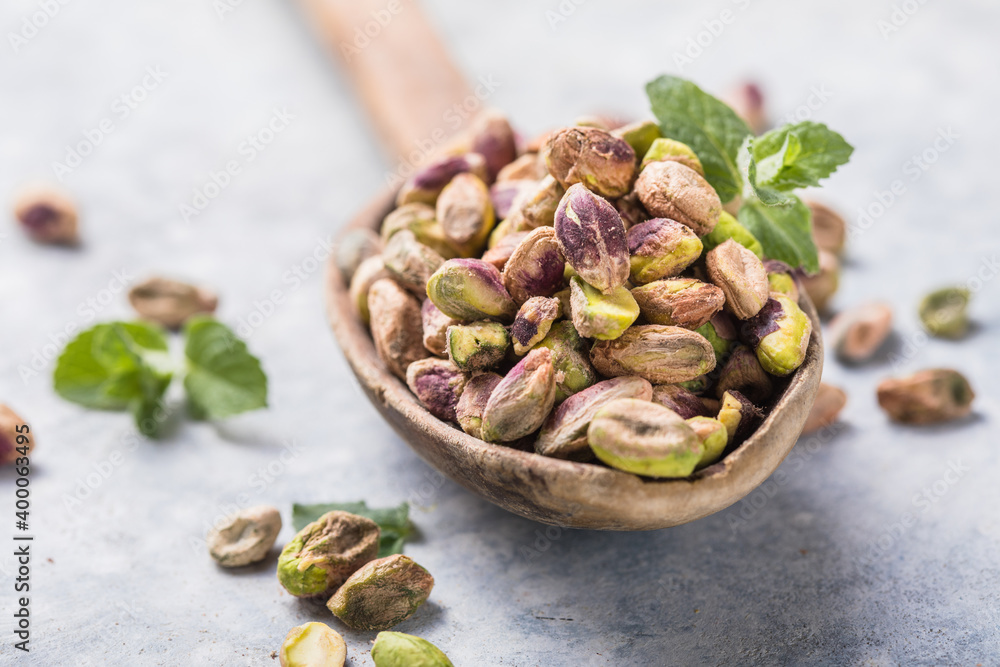 High quality peeled italian pistachio nuts , close up High quality peeled italian pistachio nuts , close up