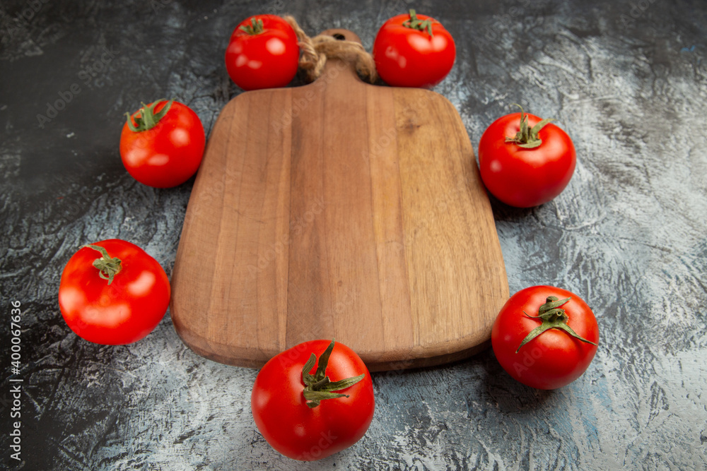 front view fresh red tomatoes on dark-light background ripe photo salad front view fresh red tomatoes on dark-light background ripe photo salad