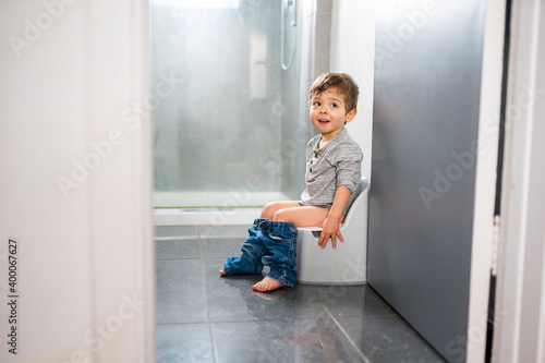 two year old boy on chamber pot, successfull hygiene