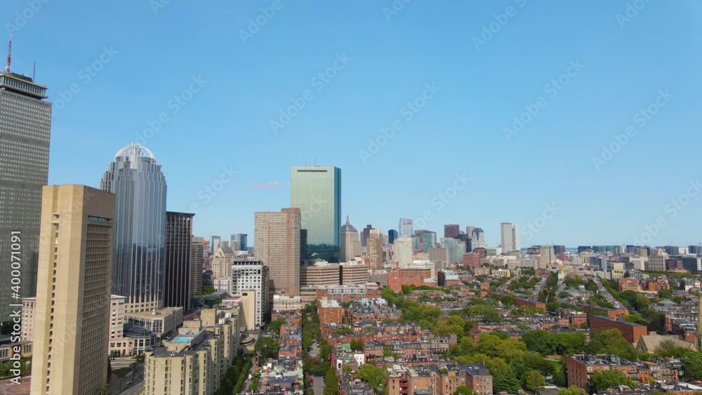 Boston Back Bay modern city skyline including John Hancock Tower, Prudential Tower, and Four Season Hotel at One Dalton Street in Boston, Massachusetts MA, USA. Boston Back Bay modern city skyline including John Hancock Tower, Prudential Tower, and Four Season Hotel at One Dalton Street in Boston, Massachusetts MA, USA.
