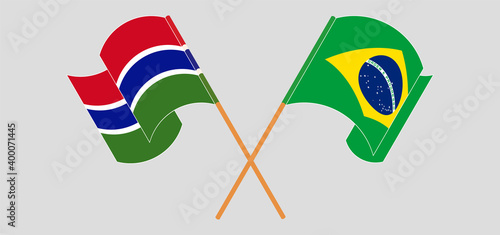 Crossed and waving flags of the Gambia and Brazil photo