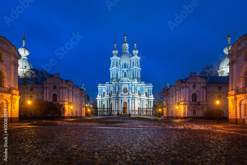 Cityscape in the evening. View of the Rastrelli Square and the Smolny Cathedral (built in baroque style) in the lights of the city illumination. Saint Petersburg, Russia.