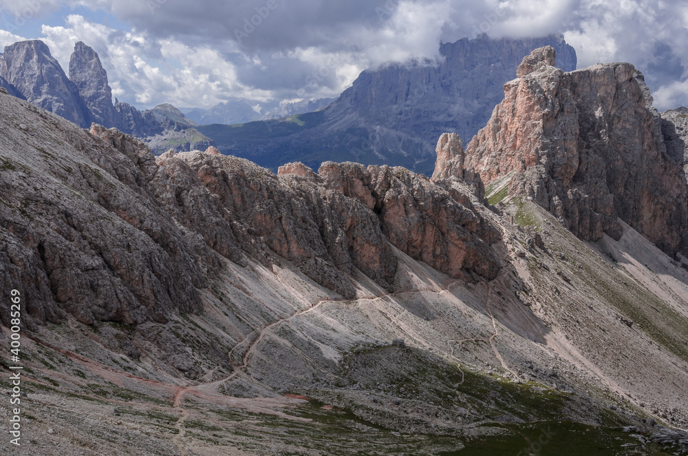 Chedul valley with Pizes da Cier mountain range on the left and Mont de Seura mountain on the right, as seen from Crespeina pass, Puez-Odle Nature park, Dolomites, South Tirol, Italy.