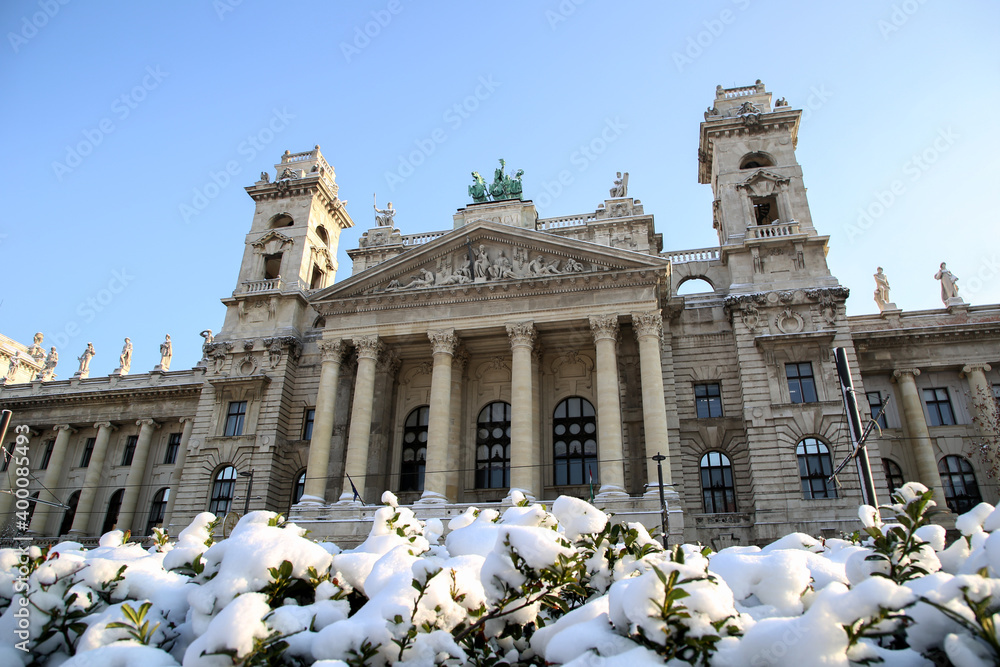 View of the ethnographic museum in Budapest in winter. Snow in Budapest. Soon New Year and Christmas.