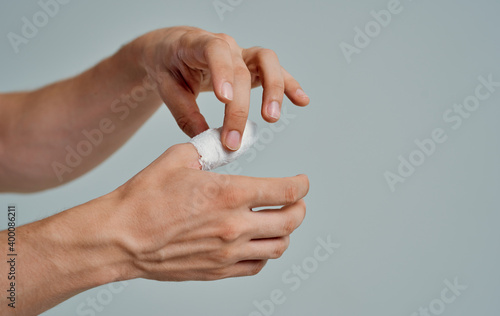 bandaged thumb health problems medicine patient isolated background