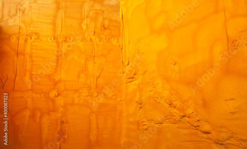 External insulation of house walls with yellow sprayed polyurethane foam