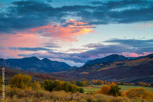 Evening skies over Colorado fields and mountains