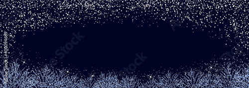 静かな冬の夜　雪と青いイルミネーションのフレーム