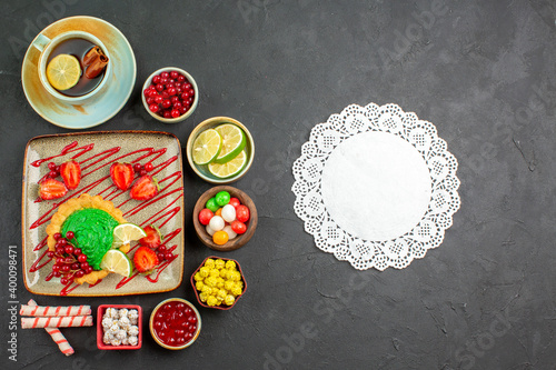 top view yummy creamy cake with fruits on a grey background dessert cookie biscuit sweet