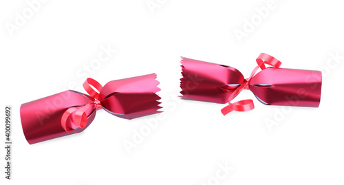 Fotografie Open red Christmas cracker isolated on white, top view