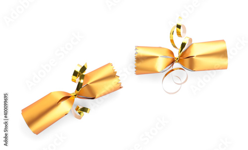 Fényképezés Open shiny golden Christmas cracker isolated on white, top view