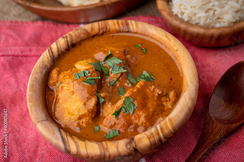 butter chicken curry with naan and basmati rice
