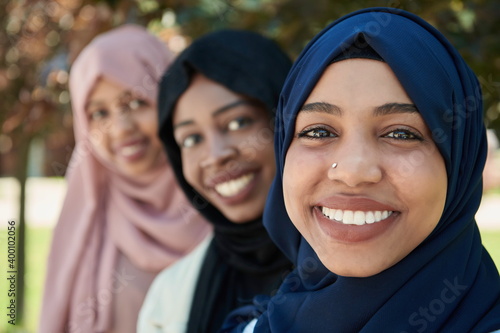 Photography businesswoman group portrait wearing traditional islamic clothes