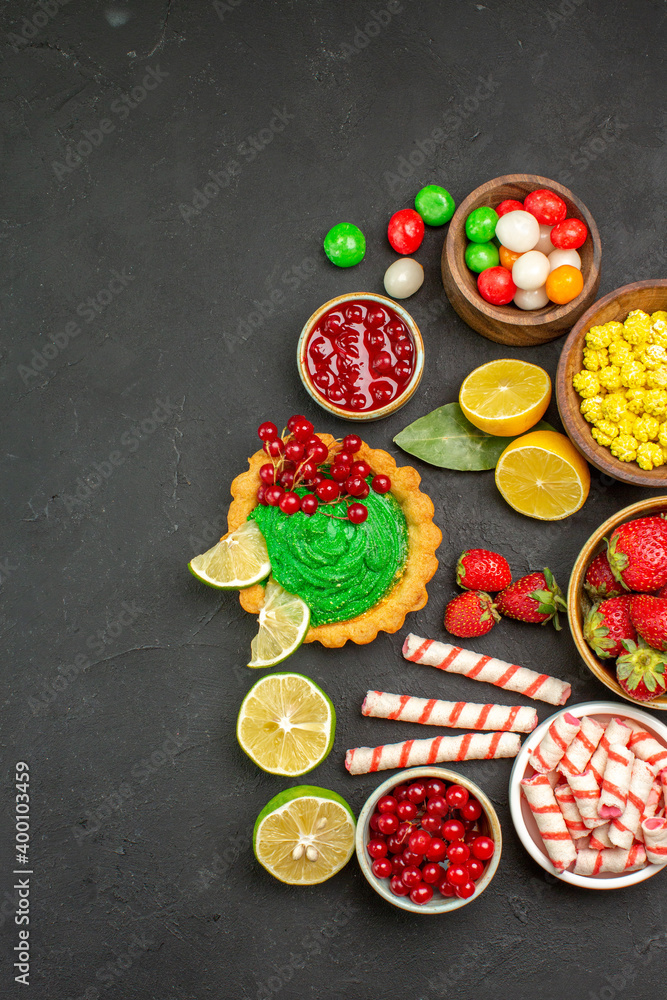 top view yummy cake with fruits and candies on a dark background cookie biscuit sweet