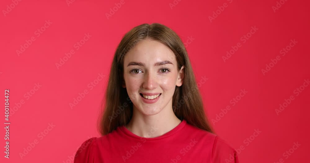 Happy young woman after using henna hair dye against color background Happy young woman after using henna hair dye against color background