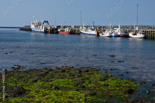 Fishing trawlers tie up at the Sandgerdi dock on Iceland's Midnes Peninsula. photo