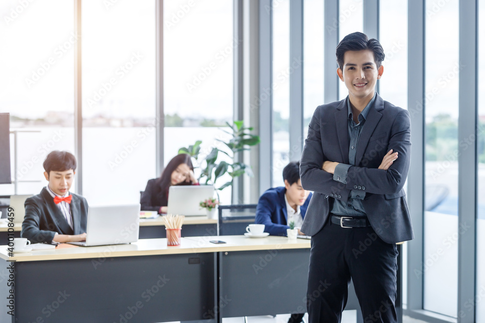 Successful company,executive Young Asian businessman partners with happy workers Group of asian business people with diverse genders (LGBT) in the meeting room at office Successful company,executive Young Asian businessman partners with happy workers Group of asian business people with diverse genders (LGBT) in the meeting room at office