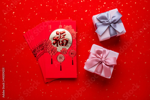 New Year gifts and red envelopes photo