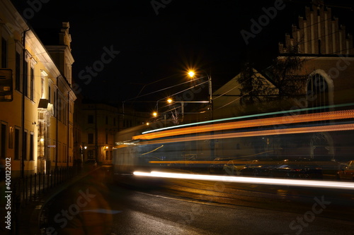 night view of the city Krakow  colorful trails of tram lights
