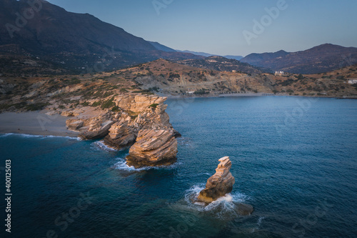 Triopetra beach, cliffs on Crete in a turquoise sea photo