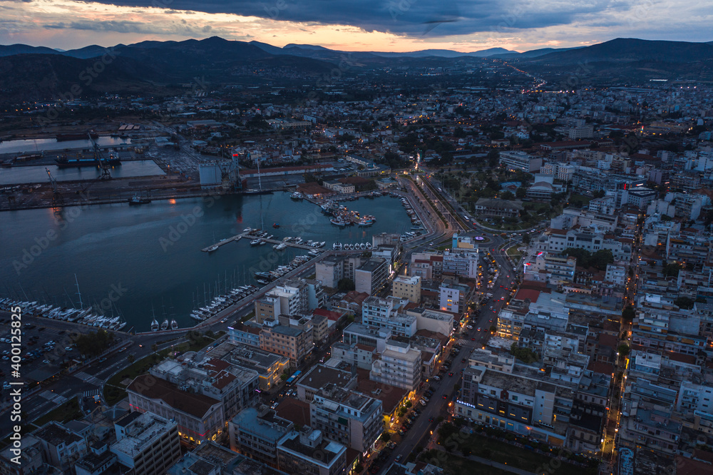 Aerial panoramic view of Volos city at twilight. Magnesia - Greece.