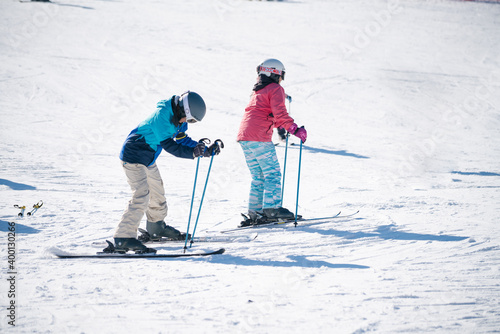 First time practicing skiing at Ski Resort South Korea. Tourists enjoy playing ski during winter season. 