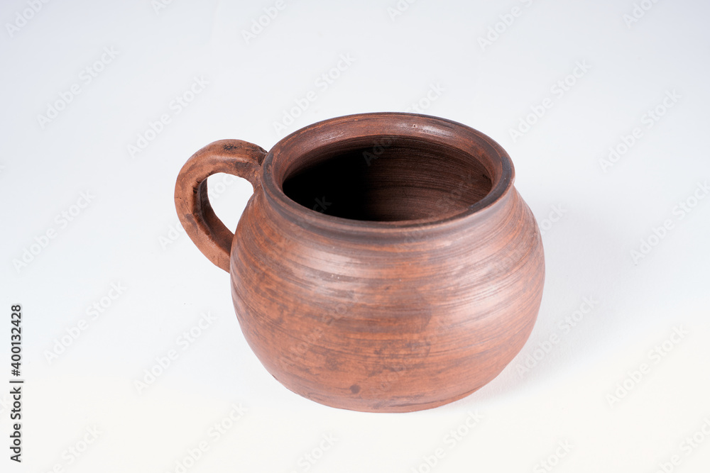 Pottery Craft, ceramic product with your own hands, made on a Potter's wheel, isolated on a white background