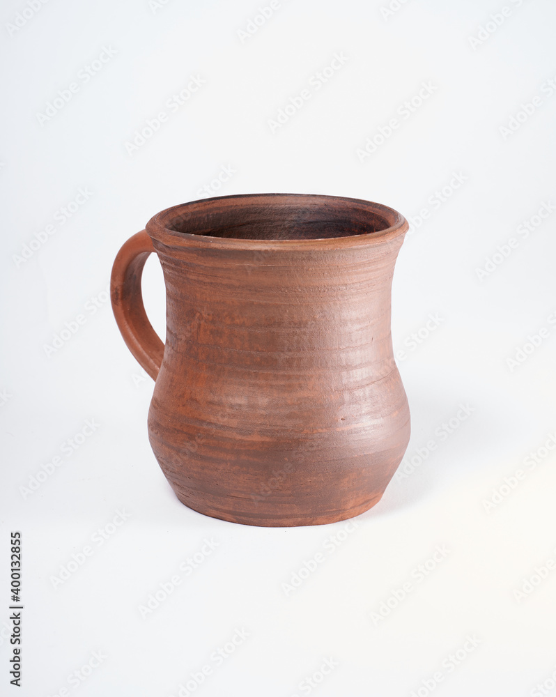 Pottery Craft, ceramic product with your own hands, made on a Potter's wheel, isolated on a white background Pottery Craft, ceramic product with your own hands, made on a Potter's wheel, isolated on a white background