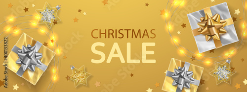 Banner for christmas sale with gold, silver gifts, garland, stars and text on golden background. Vector Holiday illustration for postcard, banner, cards, decor, design, arts, advertising.