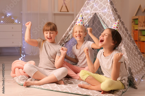 Cute little girls celebrati...