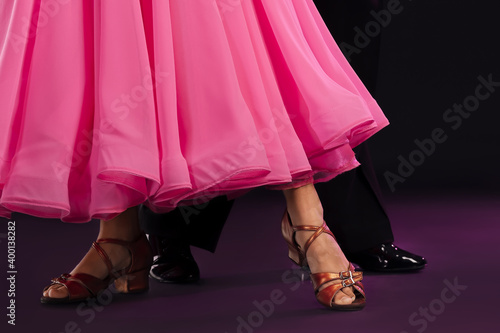Cute little children dancing against dark background