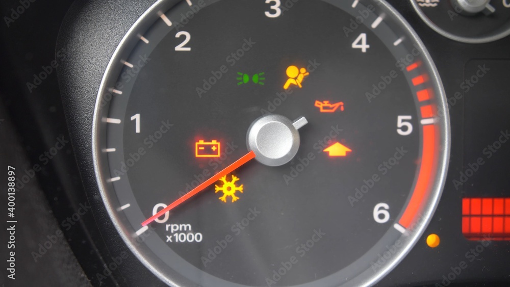 Tachometer Gauge of Starting and Stopping Car Close Up