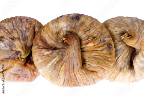 Some of dry figs fruits isolated on white background, close up