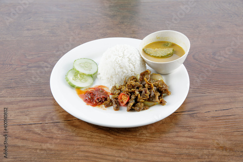 a plate of nasi berlauk photo