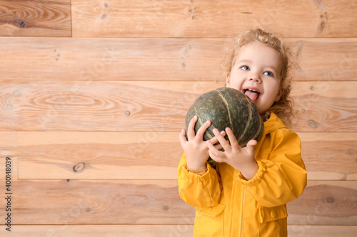 Cute little girl with pumpk...
