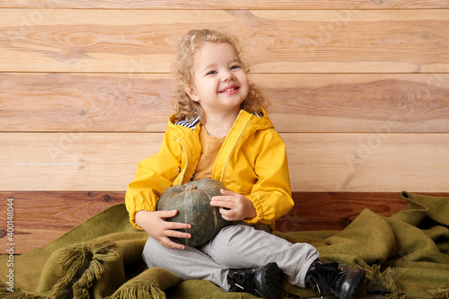 Cute little girl on wooden ...