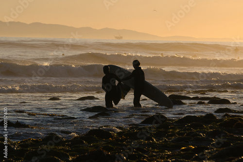 Photography surfing at sunset at Rincon point in California