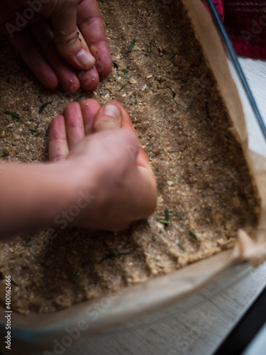 Preparation of delicious home made farm style rustic spinach pie. photo