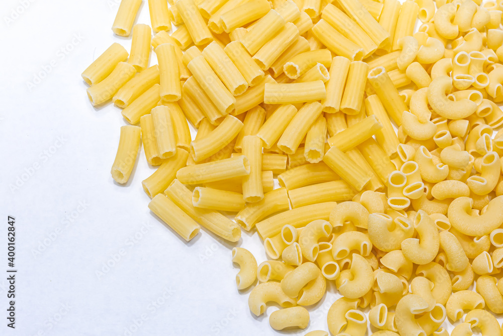 Pipe Rigate Uncooked raw Italian pipe rigate and rigatoni pasta on isolated white ...
