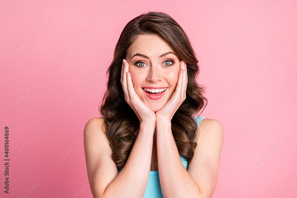 Portrait of charming optimistic brunette girl wear blue top isolated on pink color background Portrait of charming optimistic brunette girl wear blue top isolated on pink color background