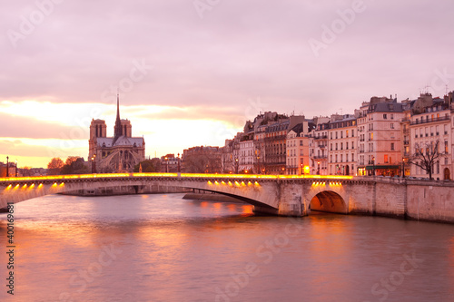 Notre Dame Cathedral on Ile de la Cite and Pont de la Tournelle bridge in Paris
