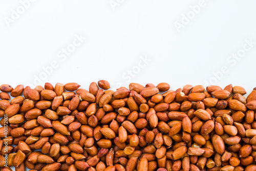 Peanuts on the white background, walnut snack