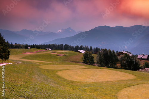 mountain golf course in crans-montana photo