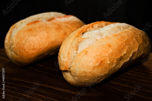Two freshly baked buns get cold on the table