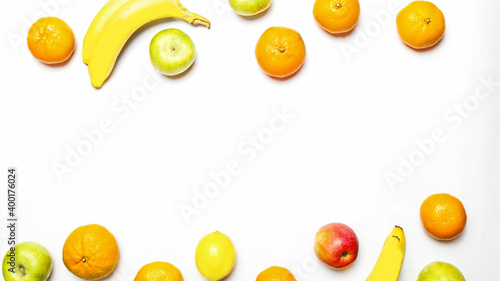 Fototapeta Naklejka Na Ścianę i Meble -  different fresh sweet fruits on a white background with copy space for text. Healthy eating