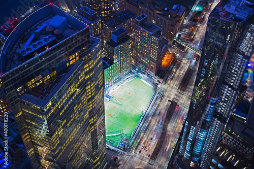 Looking down on 'Battery Park city ball fields' illuminated at night in Lower Manhattan